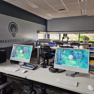 Photo of two iMac computer workstations in Sound & Vision space.